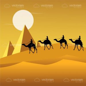 Tourists travelling on camels in sandy area